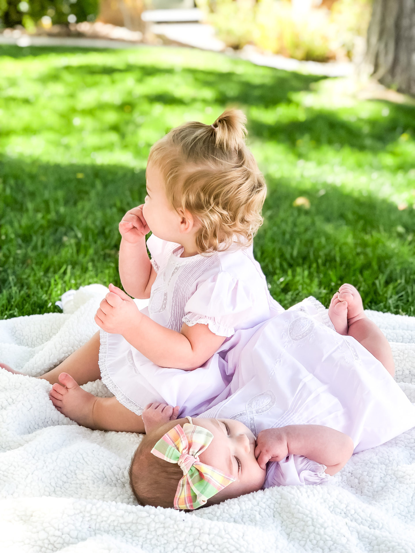 baby and toddler in easter dresses
